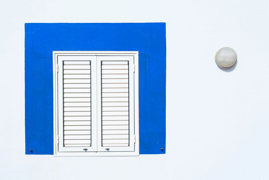 Close up of pristine white custom plantation shutters