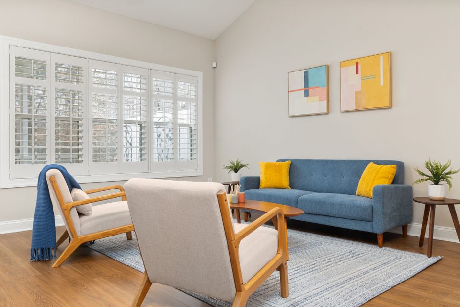 Elegant living room featuring custom plantation shutters